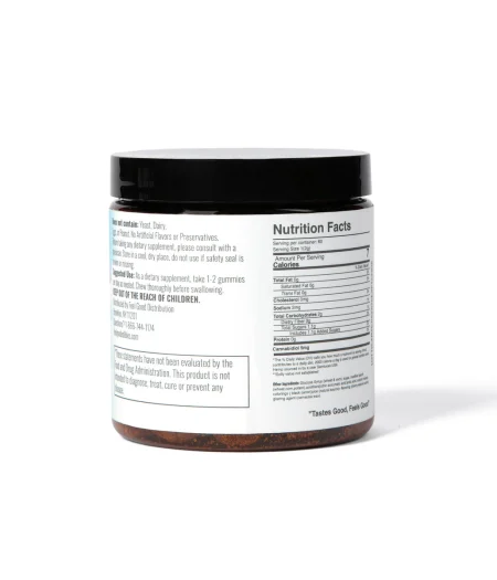 Black jar containing CBD cherry gummies with nutrition facts and usage instructions on the label.