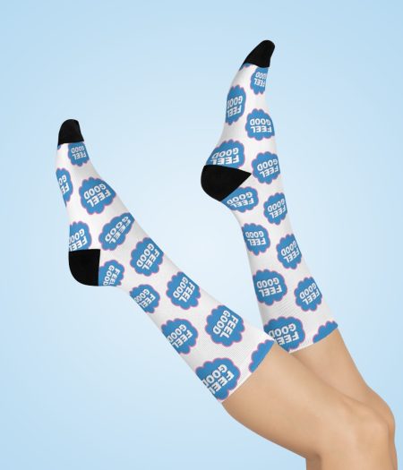 Colorful socks with 'Feel Good' text in blue, set against a light background, showcasing a fun and cheerful design.