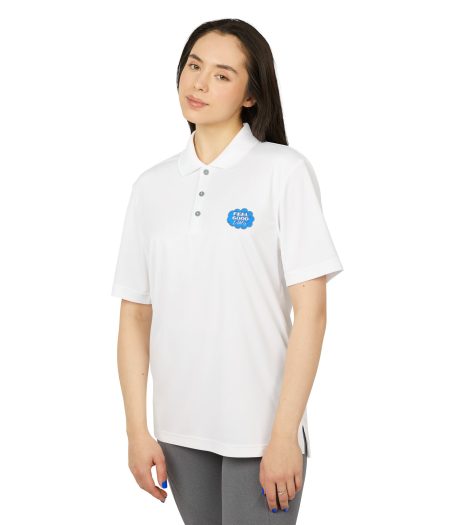Model wearing a white polo shirt with a blue "Feel Good" logo, paired with gray leggings, standing against a plain background.